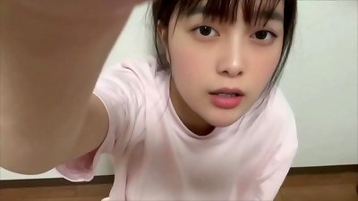 A college girl masturbates herself after imagining her friendâ€™s cock