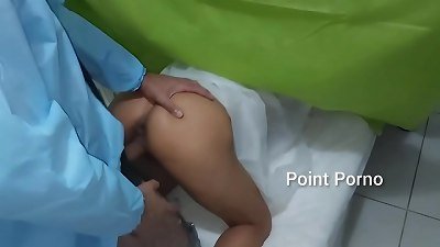 The doctor stimulates patient during vaginal and anal examination